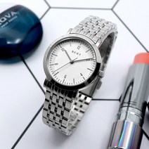 DKNY NY2509 여성 메탈 시계 도나카란 뉴욕